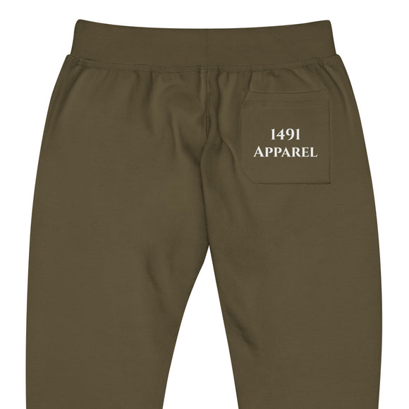 close up back view of military green joggers with White Cherokee lettering on front right leg and white 1491 Apparel on the back pocket
