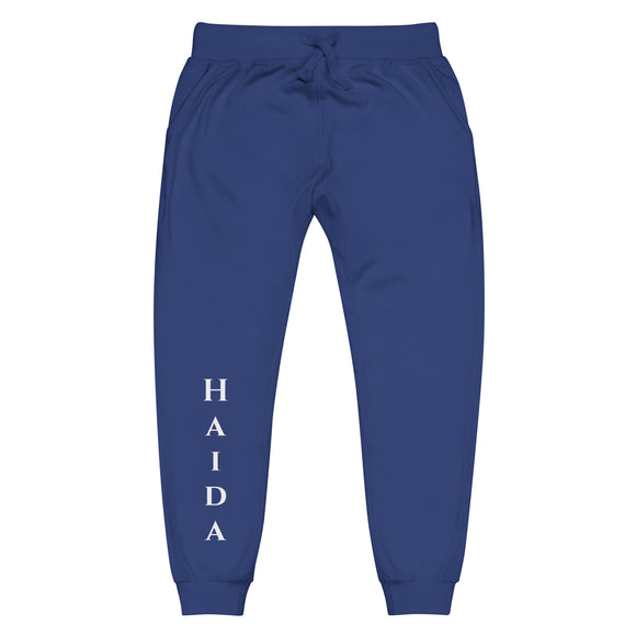 Front view of team royal joggers with White haida lettering on front lower right leg and white 1491 Apparel on the back pocket