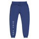 Front view of team royal blue joggers with White dene tha' lettering on front lower legs and white 1491 Apparel on the back pocket