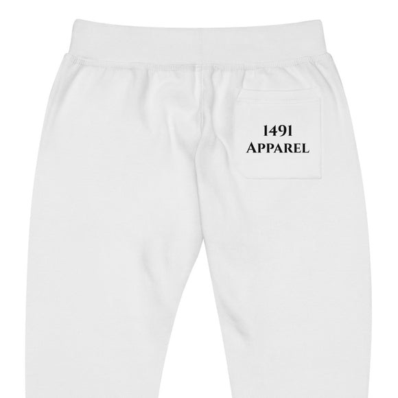 close up back view of white joggers with black chiniki lettering on front lower right leg and black 1491 Apparel on the back pocket